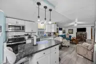 721 Blue Sail Drive SE, Bolivia, NC 28422 — 2-bedroom manufactured home in River Run Plantation, Bolivia, NC, photo 15 of 59: 14_kitchen