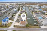 433 Dolphin Street, Sunset Beach, NC 28468 — 4-bedroom waterfront home, Sunset Beach, NC, photo 2 of 43
