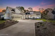3810 River Park Way NE, Leland, NC 28451 — 3-bedroom home in The Bluffs on the Cape Fear, Leland, NC, photo 1 of 49: 3810RiverParkWay-Twilight