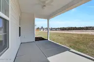 471 Galloping Foal Way SE, Bolivia, NC 28422 — 3-bedroom home in River Tide Farms, Bolivia, NC, photo 22 of 22: Covered Patio