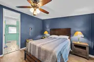 195 Calabash Road NW, Calabash, NC 28467 — 3-bedroom manufactured home in Carolina Shores, Calabash, NC, photo 21 of 37: Primary Bedroom