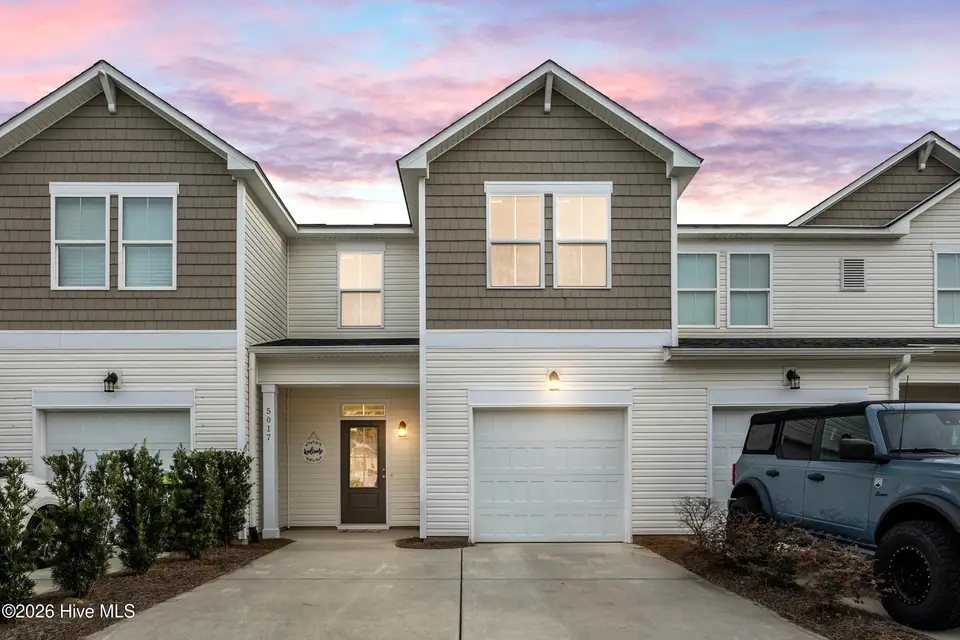 5017 Northstar Drive, Leland, NC 28451 — 3-bedroom townhome in Bishops Ridge, Leland, NC, photo 1 of 51: 1_virtual twilight