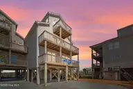 113 Anchor Drive A, Surf City, NC 28445 — 5-bedroom waterfront townhome in Topsail Cove, Surf City, NC, photo 3 of 62: 2-web-or-mls-Virtual Dusk 2_2