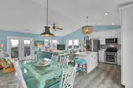 600-A N Anderson Boulevard, Topsail Beach, NC 28445 — 4-bedroom waterfront home in Topsail Beach, Topsail Beach, NC, photo 7 of 42: Dining Area, Top Floor