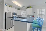 2555 St James Drive SE Unit 101, Southport, NC 28461 — 3-bedroom condo in St James, Southport, NC, photo 7 of 53: Kitchen