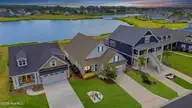 401 Summerhouse Drive, Holly Ridge, NC 28445 — 3-bedroom waterfront home in Summerhouse On Everett Bay, Holly Ridge, NC, photo 1 of 77