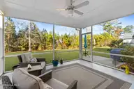 6440 Saxon Meadow Drive, Leland, NC 28451 — 3-bedroom home in Brunswick Forest, Leland, NC, photo 10 of 66: 6440 Saxon Meadow Screen Room