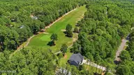 115 Cambridge Lane, Seven Lakes, NC 27376 — 3-bedroom home in Seven Lakes South, Seven Lakes, NC, photo 3 of 48: 47_DJI_20260824125851_0882_D