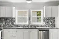 166 NE 5th Street, Oak Island, NC 28465 — 3-bedroom home in Tranquil Harbor, Oak Island, NC, photo 16 of 59: 14_kitchen