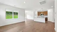 820 Fernwind Circle, Aberdeen, NC 28315 — 3-bedroom home in Martin Farms, Aberdeen, NC, photo 12 of 34: LIVING ROOM/KITCHEN