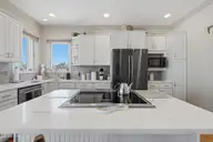 5 Osprey Circle, North Topsail Beach, NC 28460 — 3-bedroom waterfront home in Crystal Shores, North Topsail Beach, NC, photo 24 of 79: 27_kitchen