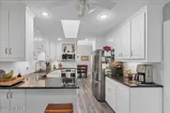 111 Sherwood Road, Seven Lakes, NC 27376 — 3-bedroom townhome in Seven Lakes South, Seven Lakes, NC, photo 23 of 50: Kitchen