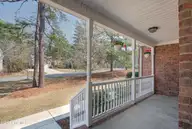 105 Kingswood Circle, Pinehurst, NC 28374 — 4-bedroom home in Pinehurst No. 6, Pinehurst, NC, photo 3 of 43: FrontPorch3