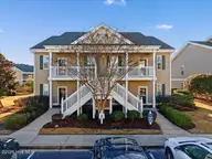 887 Great Egret Circle SW # 3, Sunset Beach, NC 28468 — 2-bedroom condo in Sandpiper Bay, Sunset Beach, NC, photo 1 of 34: 01-DJI_20260113153304_0446_D-Edit