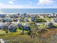 1020 W Pelican Drive, Oak Island, NC 28465 — 3-bedroom waterfront home in W. Long Beach, Oak Island, NC, photo 8 of 47: 1020 W Pelican