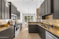 707 N Green Tee Road, Hampstead, NC 28443 — 3-bedroom waterfront home in Olde Point, Hampstead, NC, photo 19 of 62: 24_kitchen