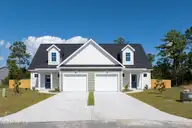 305 Coastal Reef Court, Holly Ridge, NC 28445 — 3-bedroom townhome in Coastal Village, Holly Ridge, NC, photo 1 of 27: Coastal Village - Exterior_Aerials _1