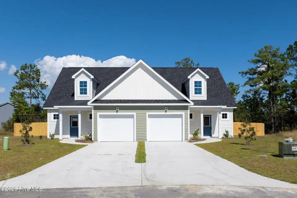 305 Coastal Reef Court, Holly Ridge, NC 28445 — 3-bedroom townhome in Coastal Village, Holly Ridge, NC, photo 1 of 27: Coastal Village - Exterior_Aerials _1