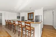 3107 Ocean Drive, Emerald Isle, NC 28594 — 6-bedroom waterfront home in Emerald Isle By The Sea, Emerald Isle, NC, photo 19 of 59: Spacious kitchen w/ bar seating