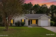 102 Tealbriar Street, Burgaw, NC 28425 — 4-bedroom home in Tealbriar, Burgaw, NC, photo 1 of 40: 102TealbriarV2Edits-1_Dusk_01