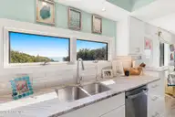 545 Salter Path Road L7, Pine Knoll Shores, NC 28512 — 4-bedroom waterfront condo in Beacon's Reach, Pine Knoll Shores, NC, photo 17 of 43: Kitchen with Views