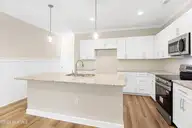 228 Cline Way Unit 131, Beaufort, NC 28516 — 3-bedroom townhome in 1809 Live Oak, Beaufort, NC, photo 2 of 37: Kitchen with Island (2)
