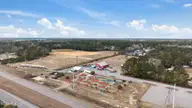 5312 Meagan Lane NE Lot 9, Winnabow, NC 28479 — 3-bedroom home in Country Walk, Winnabow, NC, photo 21 of 27: 28_dji_20260130132045_0039_d