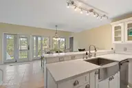 1321 Marsh Line Court SW, Shallotte, NC 28470 — 3-bedroom waterfront home in Marsh Cove, Shallotte, NC, photo 16 of 75: Quartz Counter in Kitchen