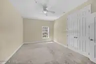 119 Covil Avenue Unit 103, Wilmington, NC 28403 — 2-bedroom condo in Covil Garden Condominiums, Wilmington, NC, photo 14 of 33: Primary Bedroom