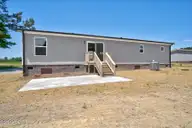 7601 Alice Court, Castalia, NC 27816 — 3-bedroom manufactured home in Culpepper Landing, Castalia, NC, photo 5 of 34: Rear View