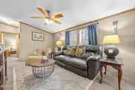 1221 Arvida Spur Road, Rocky Point, NC 28457 — 4-bedroom manufactured home in Arvida Lands, Rocky Point, NC, photo 24 of 44: 27_family room