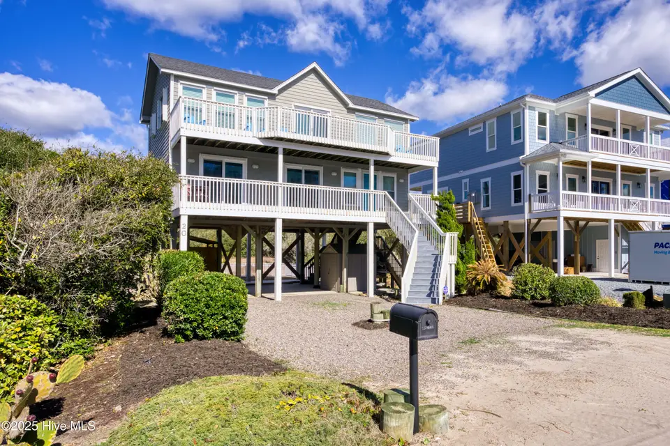 20 Porpoise Place, North Topsail Beach, NC 28460 — 4-bedroom waterfront home in Dolphin Shores, North Topsail Beach, NC, photo 1 of 64: 20 Porpoise Place - Aerial_12