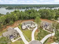 325 Sloan Lane, Pinehurst, NC 28374 — 4-bedroom home in Longleaf Pointe, Pinehurst, NC, photo 1 of 50: 7-web-aerial with lake