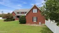 2239 Autumn Drive, Kinston, NC 28501 — 5-bedroom home in Briary, Kinston, NC, photo 3 of 64: Side view