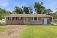 2554 E Forest Drive, Newport, NC 28570 — 5-bedroom home in West Newport, Newport, NC, photo 2 of 54: Front Elevation