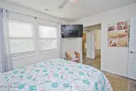 2909 Pointe West Drive 3b1, Emerald Isle, NC 28594 — 2-bedroom waterfront condo in Pier Pointe, Emerald Isle, NC, photo 17 of 34: Primary Bedroom Suite, V3