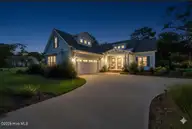9139 Fallen Pear Lane NE, Leland, NC 28451 — 4-bedroom home in The Bluffs on the Cape Fear, Leland, NC, photo 4 of 57: Night View