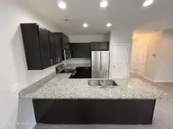 84 Aspen Road, Hampstead, NC 28443 — 3-bedroom townhome in Cypress Grove, Hampstead, NC, photo 6 of 28: Kitchen.1