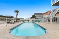 1012 W Beach Drive, Oak Island, NC 28465 — 5-bedroom waterfront home in Long Beach, Oak Island, NC, photo 11 of 70: 11-web-or-mls-CAMMediaLLC.com (81 of 83)