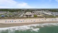 9100 Reed Drive 3107, Emerald Isle, NC 28594 — 1-bedroom waterfront condo in Queens Court, Emerald Isle, NC, photo 1 of 50: 50-web-or-mls-DJI_20250604115505_0152_D