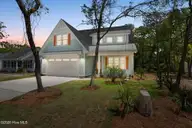 114 NE 31st Street, Oak Island, NC 28465 — 4-bedroom home, Oak Island, NC, photo 2 of 69: 4-web-or-mls-CAMMediaLLC.com (13 of 75)