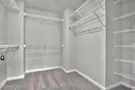 6825 Fellowship Drive, Leland, NC 28451 — 5-bedroom home in Grand Park, Leland, NC, photo 21 of 31: Primary Closet