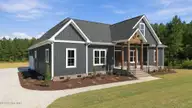 7451 Grover Road, Nashville, NC 27856 — 4-bedroom home in Whispering Pines, Nashville, NC, photo 1 of 65: 40-web-or-mls-DJI_20260917151252_0778_D