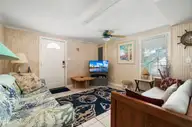 401 E Atlantic Boulevard, Atlantic Beach, NC 28512 — 4-bedroom waterfront home, Atlantic Beach, NC, photo 23 of 61: Living room view