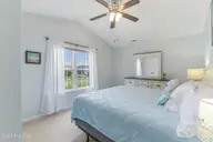 1803 W Yacht Drive, Oak Island, NC 28465 — 3-bedroom home in Pinners Point, Oak Island, NC, photo 16 of 39: Front Bedroom
