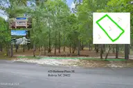 625 Barbosa Place SE, Bolivia, NC 28422 — waterfront lot in Seawatch @ Sunset Harbor, Bolivia, NC, photo 1 of 26