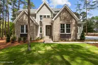 62 Mcmichael Drive, Pinehurst, NC 28374 — 3-bedroom home in Pinewild CC, Pinehurst, NC, photo 1 of 61: 1-web-or-mls-707A3343