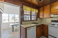 2011 W Beach Drive, Oak Island, NC 28465 — 4-bedroom waterfront home in W. Long Beach, Oak Island, NC, photo 13 of 51: 31-web-or-mls-BTS00026