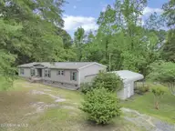 552 Colonial Landing Road SE, Bolivia, NC 28422 — 2-bedroom waterfront manufactured home in Vineyard Landing, Bolivia, NC, photo 7 of 52: 7-web-or-mls-Front aerial