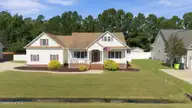124 Mom Lane, New Bern, NC 28562 — 4-bedroom home in Forest Run, New Bern, NC, photo 1 of 46: 2-web-or-mls-DJI_20261015114339_0119_D